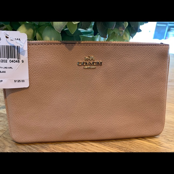 Brand new with tags Blush Coach wristlet - Picture 2 of 4